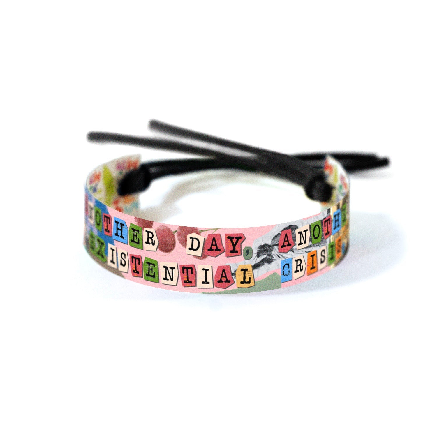 Collage-style graphic with the phrase 'Another Day, Another Existential Crisis' spelled out in ransom-note-style cutout letters. The background includes colorful elements, such as flowers, cameras, torn paper, and a cityscape portraying existential crisis in an introspective and witty way.