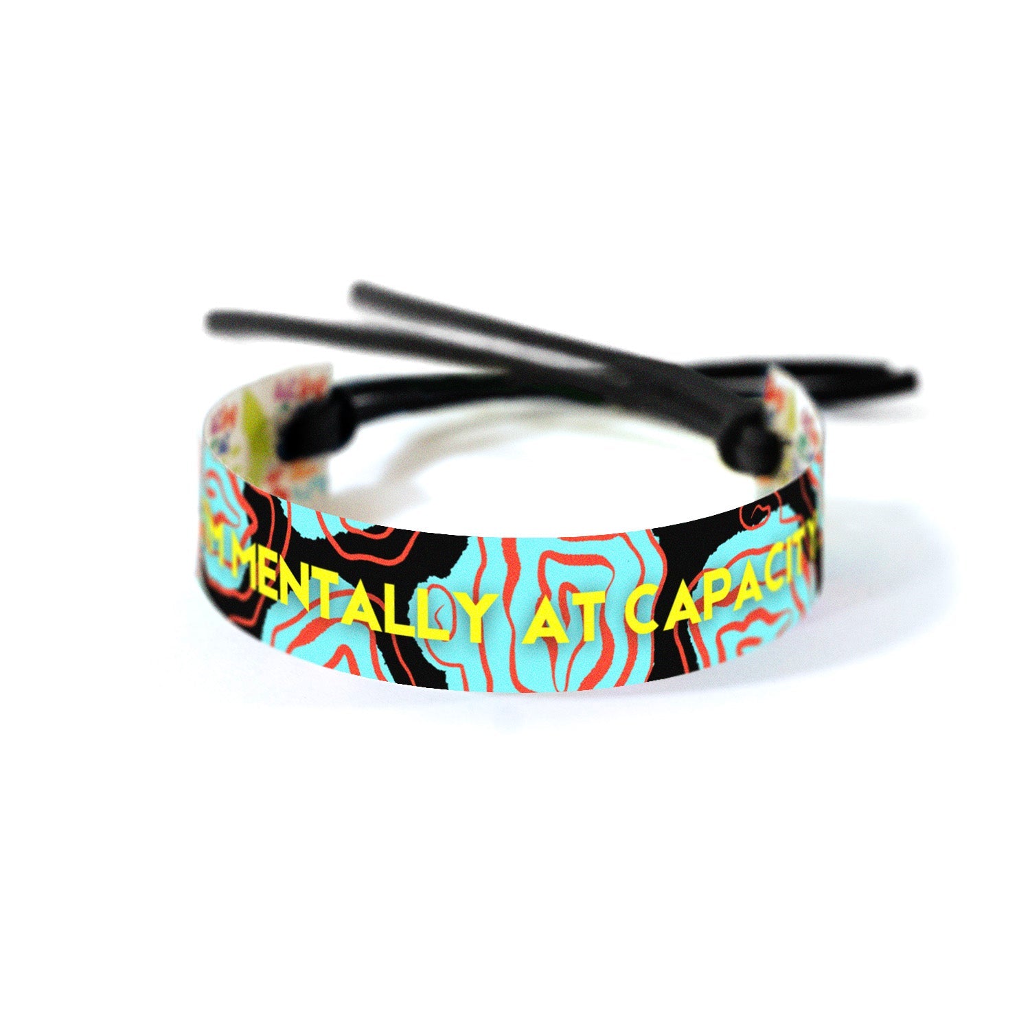 Bold yellow text reading 'I’M MENTALLY AT CAPACITY.' against a black background with abstract wavy shapes in red and cyan, creating a dynamic and chaotic visual effect depicting the heaviness of mental load.