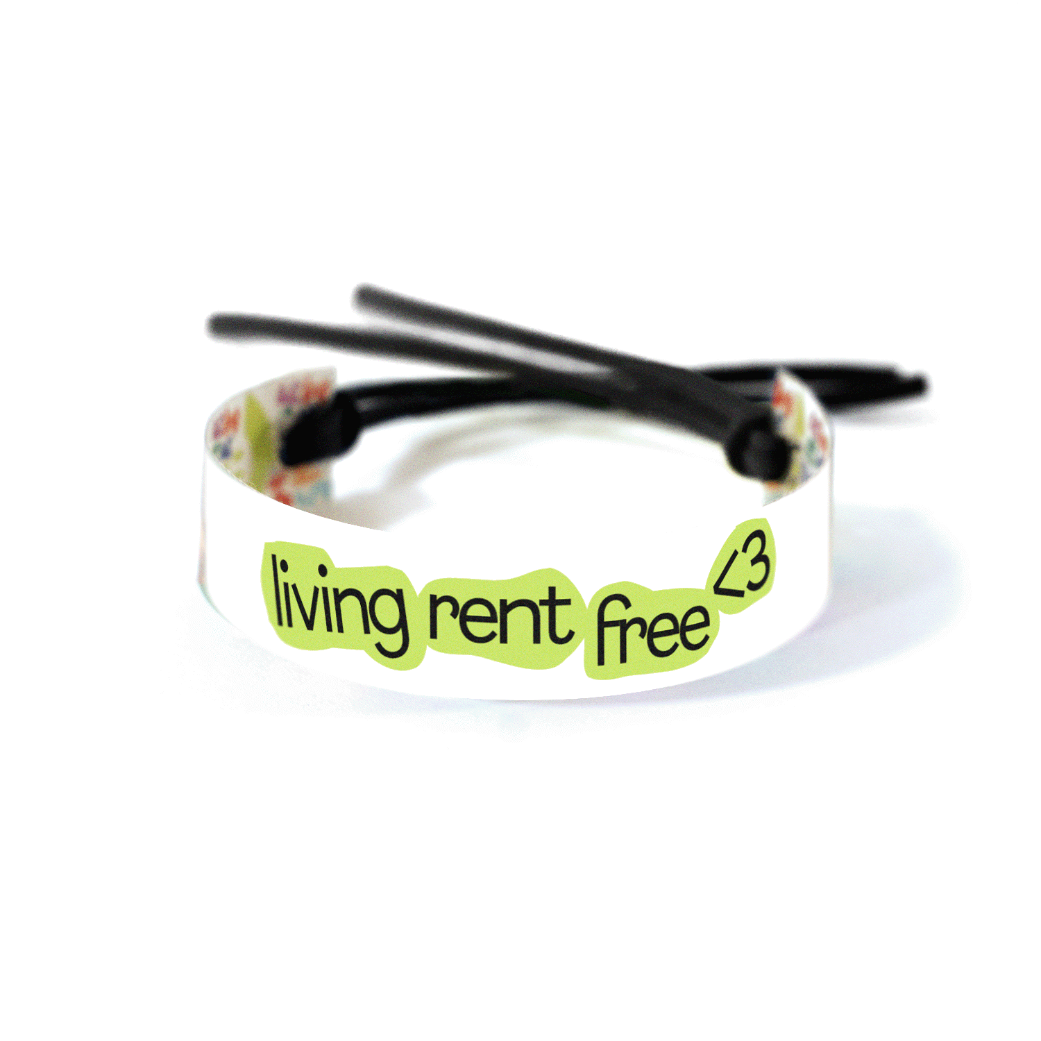 “Living Rent Free <3” text with green abstract shapes on a white background.